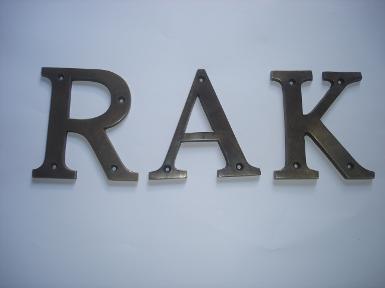 Brass letter size high 10 cm.